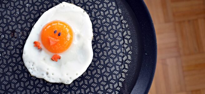 An ironic sunny side up egg with a smiley face