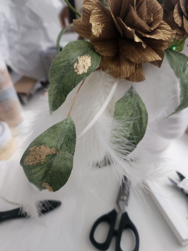 Gold leaf added randomly to the leaves and petals.